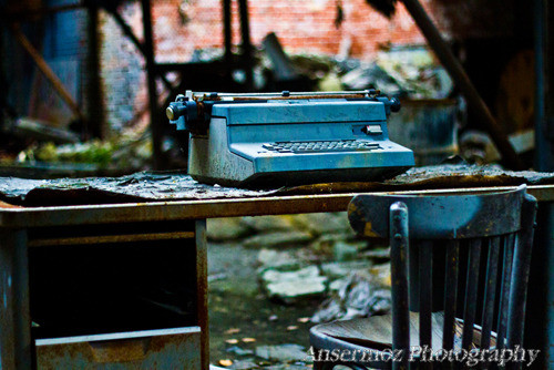 Typewriter on desk in abandoned places