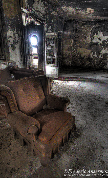 Old armchair in burnt room, Ste Clotilde de Horton Asylum