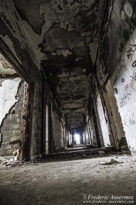 Abandoned building Quebec, Asylum corridor with peeling paint