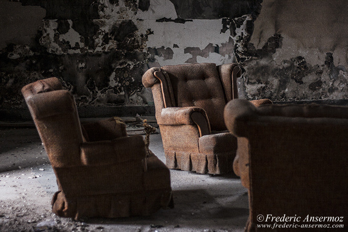 Old armchairs in an abandoned building