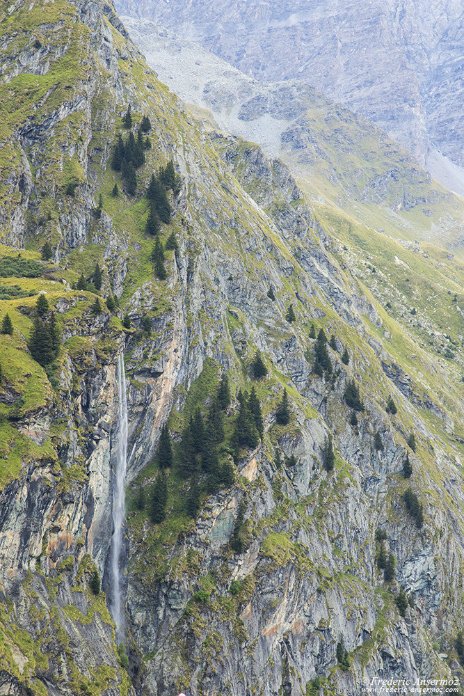 Waterfall along the cliffs of Val de Bagnes, Valais, Switzerland