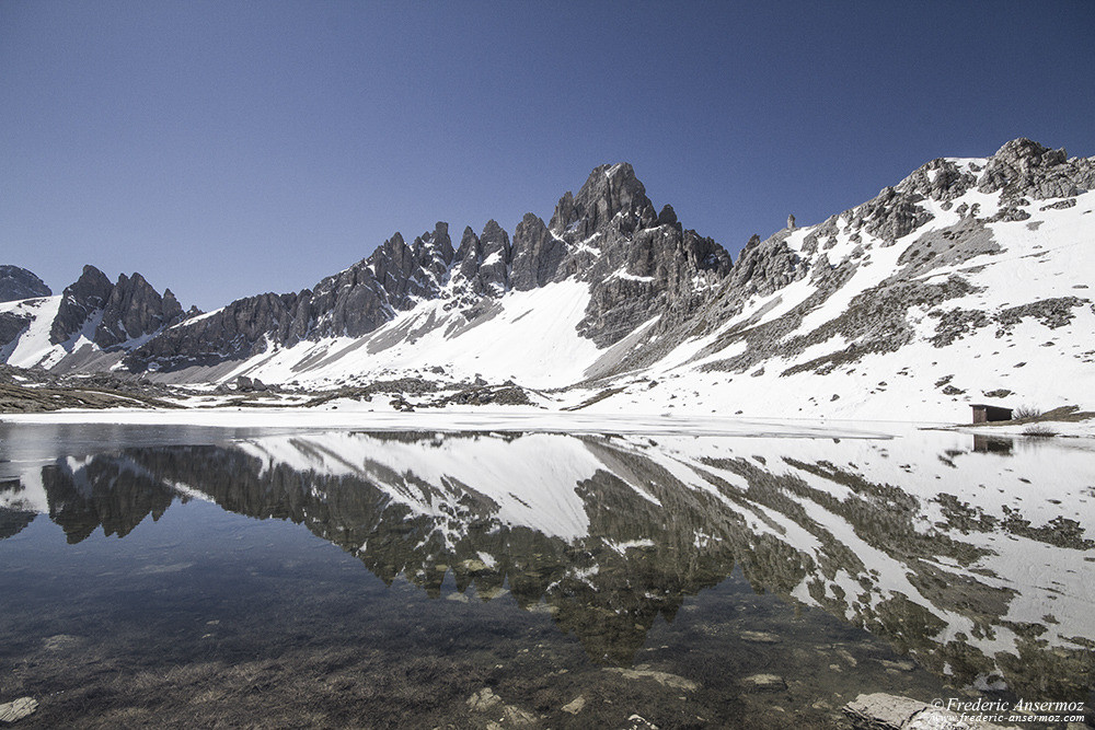 Water reflection on lake in the mountains,Laghi del Piani, Italian Alps