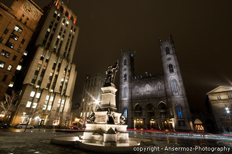 Basilica Notre Dame of Montreal by night at Place d'Armes