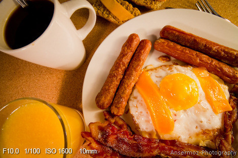 Coffee cup, orange juice and meat breakfast